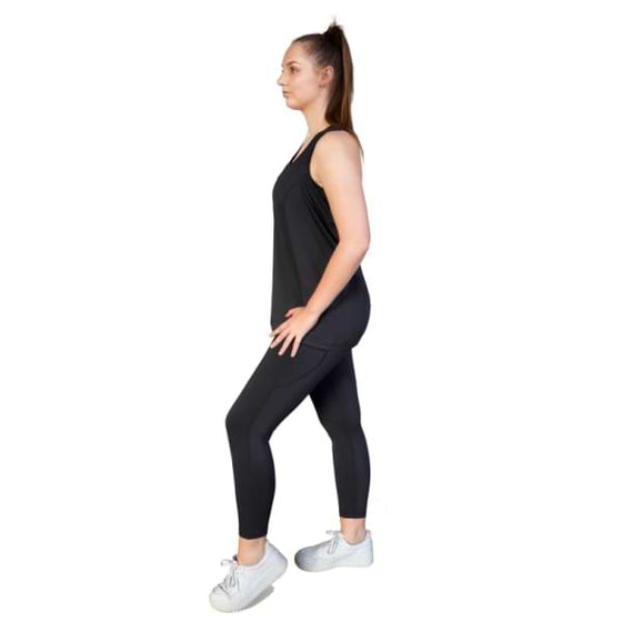Black 7/8th leggings from Milbel Active - side view of girl modelling black tank top and leggings