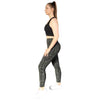 Black sports bra from Milbel Active - side view of girl modelling black sports bra and floral leggings