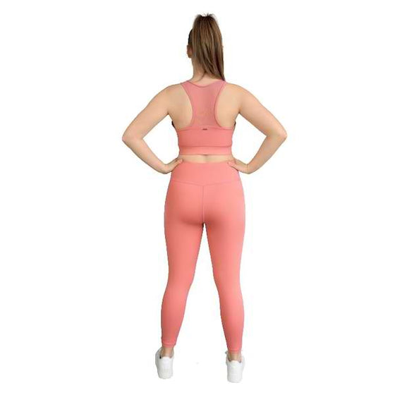 Pink sports bra from Milbel Active - back view of girl modelling pink sports bra and leggings